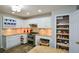 Bright kitchen features white cabinets, stainless steel appliances and a pantry at 132 Picketts Creek Dr, Acworth, GA 30101
