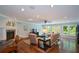 Spacious living room with hardwood floors, fireplace and recessed lighting at 132 Picketts Creek Dr, Acworth, GA 30101