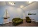 Upstairs living room with soft blue walls, cozy seating, and unique sailboat decor at 132 Picketts Creek Dr, Acworth, GA 30101