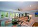 Bright living room with hardwood floors, patio access and comfortable furniture at 132 Picketts Creek Dr, Acworth, GA 30101