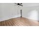 Spacious bedroom with laminate floors and ample natural light, featuring two large closets at 170 White Rose Ln, Temple, GA 30179