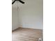 Clean bedroom showcasing modern flooring and an open closet at 170 White Rose Ln, Temple, GA 30179