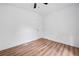 This bedroom features wood floors, neutral walls, and a closet at 170 White Rose Ln, Temple, GA 30179