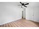 This bedroom features wood floors, neutral walls, and a closet at 170 White Rose Ln, Temple, GA 30179