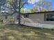 Home exterior featuring new stairs and landscaping at 170 White Rose Ln, Temple, GA 30179
