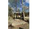 An open frame wooden structure on a concrete pad at 170 White Rose Ln, Temple, GA 30179