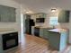 Functional kitchen featuring stainless steel appliances, butcher block countertops, and stylish updated cabinetry at 170 White Rose Ln, Temple, GA 30179