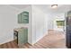 View of kitchenette featuring built in oven and wood-look floors at 170 White Rose Ln, Temple, GA 30179