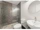 Bathroom with modern features including glass door shower and vessel sink at 2488 Fontainebleau Dr, Dunwoody, GA 30360