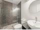 Modern bathroom with frameless shower and unique basin sink at 2488 Fontainebleau Dr, Dunwoody, GA 30360