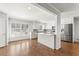 Bright eat-in kitchen with stainless steel appliances, custom cabinets, granite countertops and hardwood floors at 2488 Fontainebleau Dr, Dunwoody, GA 30360
