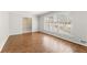 Bright and airy living room with hardwood floors and large windows overlooking the front yard at 2488 Fontainebleau Dr, Dunwoody, GA 30360