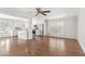Cozy living room has fireplace, hardwood floors and natural light at 2488 Fontainebleau Dr, Dunwoody, GA 30360