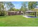 Large backyard with ample green space and gazebo at 5702 Forest Dr, Acworth, GA 30102