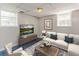 Finished basement living room with neutral color palette and natural lighting at 5702 Forest Dr, Acworth, GA 30102