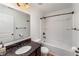 Bathroom with tub-shower combo, granite vanity, and bronze fixtures at 2022 Boxwood Ln, Canton, GA 30114