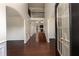 Bright foyer featuring dark hardwood flooring, high ceilings, and an open staircase at 2022 Boxwood Ln, Canton, GA 30114