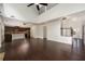 Open floor plan featuring a large living room with hardwood floors, fireplace, and access to the kitchen at 2022 Boxwood Ln, Canton, GA 30114