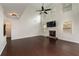 Spacious living room with soaring ceilings, fireplace, and dark hardwood flooring at 2022 Boxwood Ln, Canton, GA 30114
