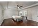 Spacious main bedroom with tray ceilings, hardwood floors, and lots of natural light at 2022 Boxwood Ln, Canton, GA 30114
