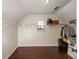 Spacious walk-in closet with wood floors, sloped ceilings, and wire shelving for optimal storage at 2022 Boxwood Ln, Canton, GA 30114