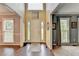 Inviting foyer with hardwood floors, high ceilings, and sidelight windows providing natural light at 3160 Bailey Cove Ct, Dacula, GA 30019
