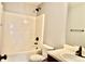 Standard bathroom with a shower-tub combo and matching fixtures at 5635 Cedar Pass, Fairburn, GA 30213