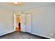Bedroom showing neutral walls, carpeting, closet and attached bath at 5635 Cedar Pass, Fairburn, GA 30213