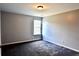 Bedroom features a large window and neutral decor at 5635 Cedar Pass, Fairburn, GA 30213