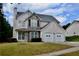 Charming two-story home featuring stone accents and a two-car garage at 5635 Cedar Pass, Fairburn, GA 30213