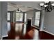 Inviting living room with hardwood floors, fireplace, and plenty of natural light at 5635 Cedar Pass, Fairburn, GA 30213