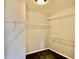 Walk-in closet with white shelving and neutral walls at 5635 Cedar Pass, Fairburn, GA 30213