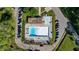 Aerial view of the community pool and surrounding neighborhood; ample parking and mature trees at 917 Gaylemont Cir, Decatur, GA 30033
