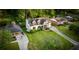 Expansive aerial view of home with lush lawn, mature trees, and beautiful landscaping at 917 Gaylemont Cir, Decatur, GA 30033