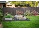 Landscaped backyard featuring raised garden beds and a dark stained privacy fence at 917 Gaylemont Cir, Decatur, GA 30033