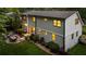 Overhead backyard view featuring manicured lawn, a patio, and plentiful foliage at 917 Gaylemont Cir, Decatur, GA 30033