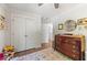 Bedroom space featuring a closet, dresser, and light colored walls and trim at 917 Gaylemont Cir, Decatur, GA 30033