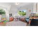 Bright bedroom featuring a play tent and natural light from large windows at 917 Gaylemont Cir, Decatur, GA 30033