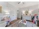 Cozy bedroom featuring a large dresser, a play table, and neutral paint at 917 Gaylemont Cir, Decatur, GA 30033