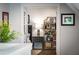 Inviting bedroom with decor, a bookshelf, and views of the interior hallway at 917 Gaylemont Cir, Decatur, GA 30033