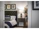 Tastefully decorated bedroom featuring a tufted headboard, stylish nightstand, and elegant accents at 917 Gaylemont Cir, Decatur, GA 30033
