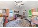 Charming ' bedroom with a crib, daybed, and soft pink accents at 917 Gaylemont Cir, Decatur, GA 30033