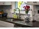 Kitchen featuring dark counter top and stainless steel faucet at 917 Gaylemont Cir, Decatur, GA 30033