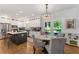 Bright eat-in kitchen features stainless steel appliances, island, and white cabinets at 917 Gaylemont Cir, Decatur, GA 30033