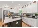 Spacious kitchen boasts modern appliances, center island, and ample cabinet space at 917 Gaylemont Cir, Decatur, GA 30033
