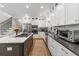 Bright kitchen featuring a center island and stainless steel appliances at 917 Gaylemont Cir, Decatur, GA 30033