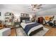 Comfortable main bedroom featuring hardwood floors, a Peloton exercise bike, and area rug at 917 Gaylemont Cir, Decatur, GA 30033