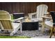 Inviting outdoor firepit area with Adirondack chairs, perfect for entertaining guests at 917 Gaylemont Cir, Decatur, GA 30033