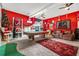 Basement featuring a pool table, bar stools, leather furniture, and sports decor at 2498 Highway 212, Covington, GA 30016