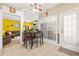 Eat-in dining area featuring a tile floor, with a view of living room and access to backyard at 2498 Highway 212, Covington, GA 30016
